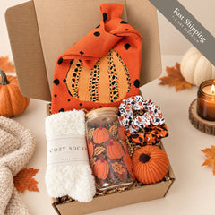 Halloween boo basket gift box with pumpkin tote, glass cup, cozy socks, scrunchies and crochet pumpkin