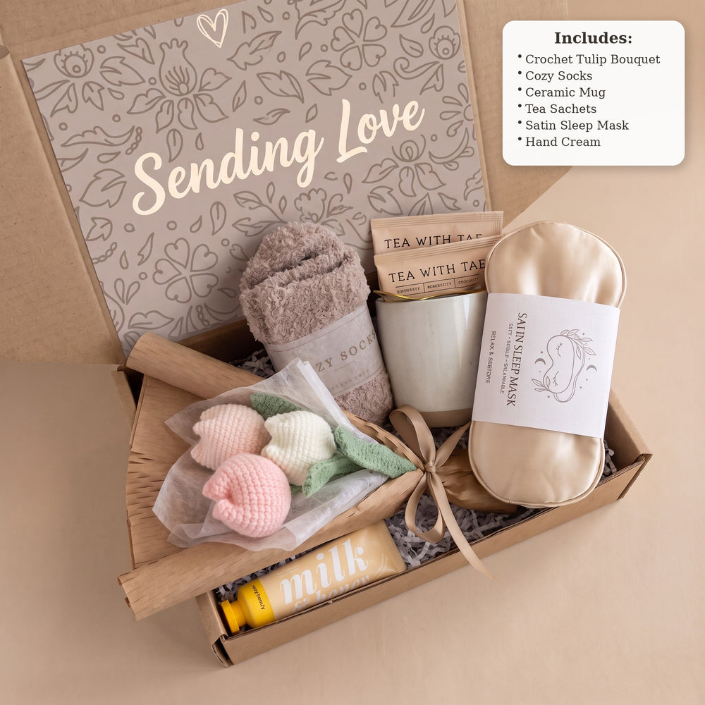 What's inside the hug in a box care package – crochet tulip bouquet, ceramic mug, cozy socks, tea sachets, satin sleep mask, hand cream