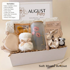 What's inside the Soft Bloom Retreat birthday gift box: tumbler, throw blanket, eye mask, socks, tea and honey